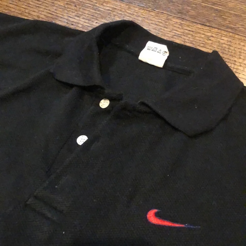 Nike black textured polo
